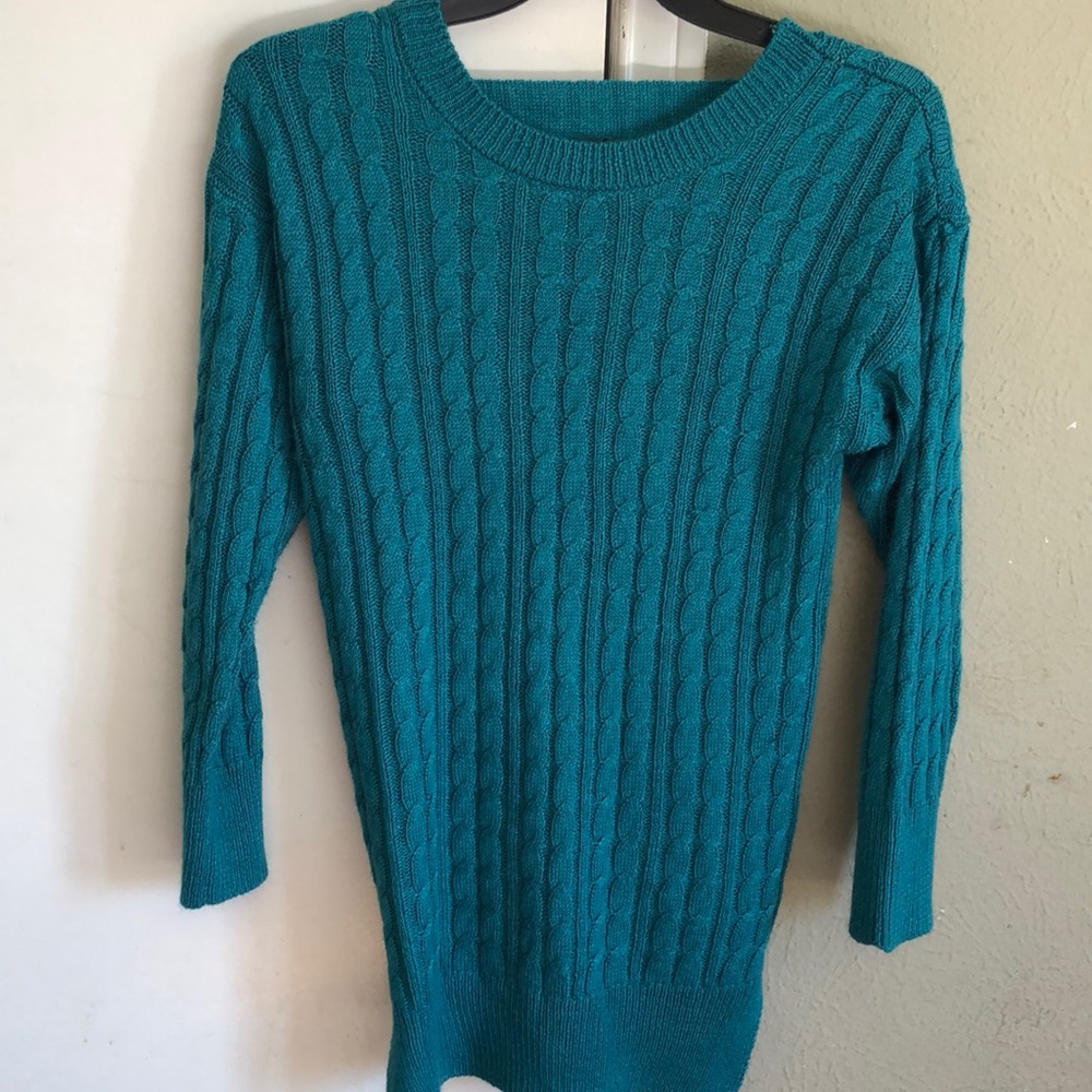 Nice open in the back sweater.